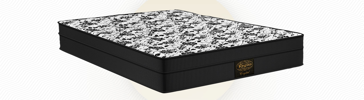 Colchão molas Superlastic King Star com as laterais na cor preta e a superfície com detalhes em preto e branco
