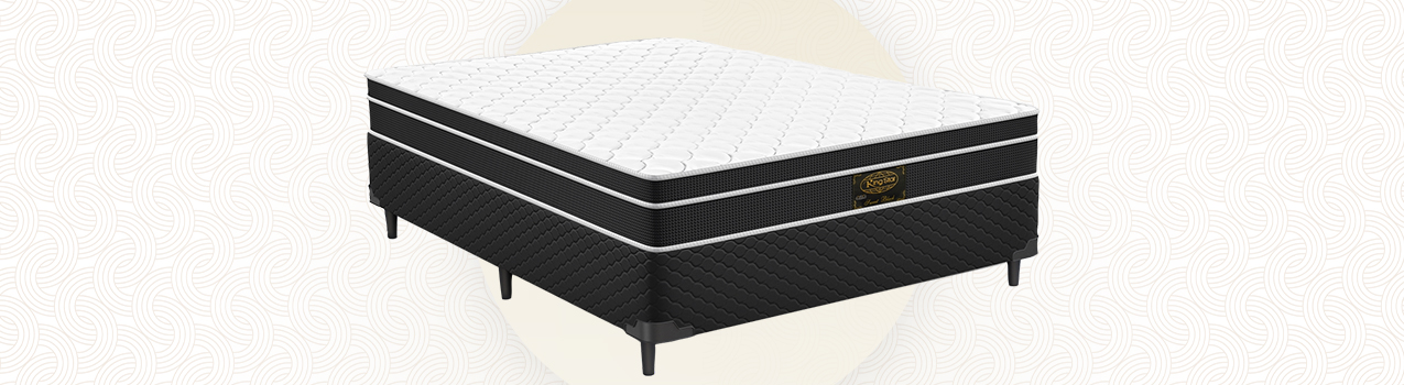 Imagem de um colchão com cama box King Star com a superfície branca e as laterais na cor preta. Imagem de um colchão com cama box King Star com a superfície branca e as laterais na cor preta.